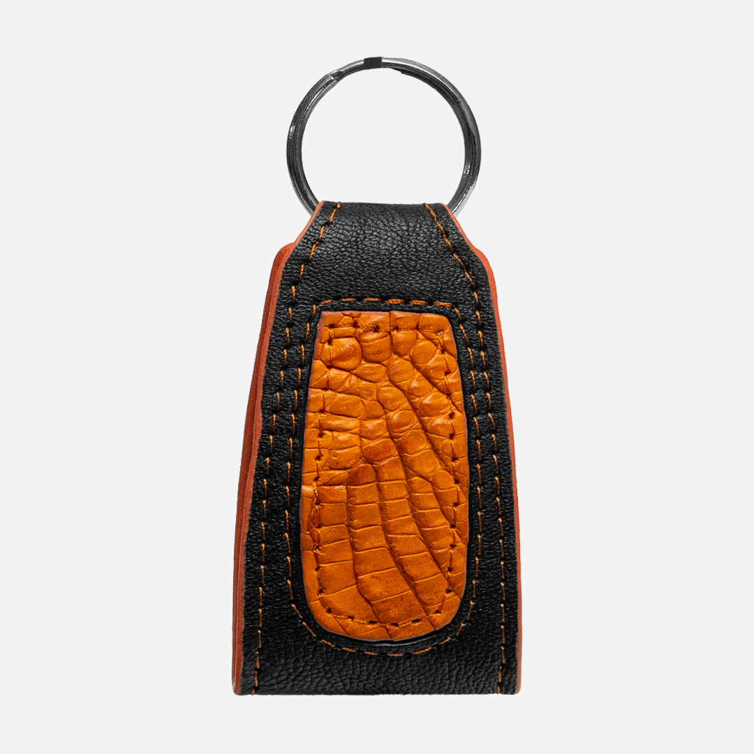 Llavero "The Shield" - Billionaire Croc Orange Sunset