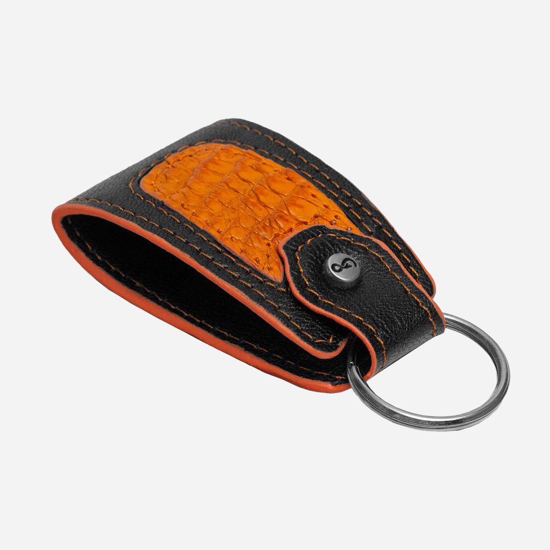 Llavero "The Shield" - Billionaire Croc Orange Sunset